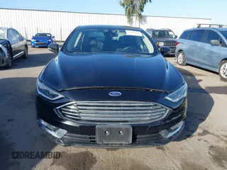 2017 Ford Fusion Energi SE with VIN 3FA6P0PU0HR129792, listed as a IAAI auction lot 41104376 with 86,659 mi miles. Bid and sale history available at carsss.com. Image 12.