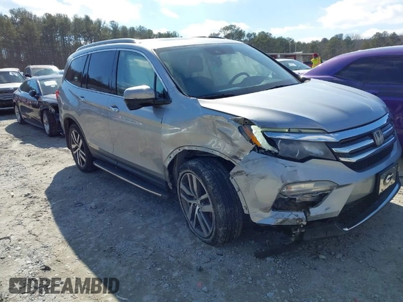 2017 Honda Pilot Touring with VIN 5FNYF6H94HB006873, listed as a IAAI auction lot 41618529 with 154,689 mi miles. Bid and sale history available at carsss.com. Image 1.