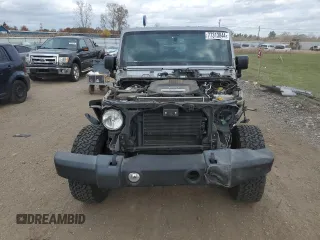 2018 Jeep Wrangler JK Unlimited Sport S with VIN 1C4BJWDG2JL908286, listed as a Copart auction lot 77313844 with 69,497 mi miles and Salvage Title. Bid and sale history available at carsss.com. Image 5.