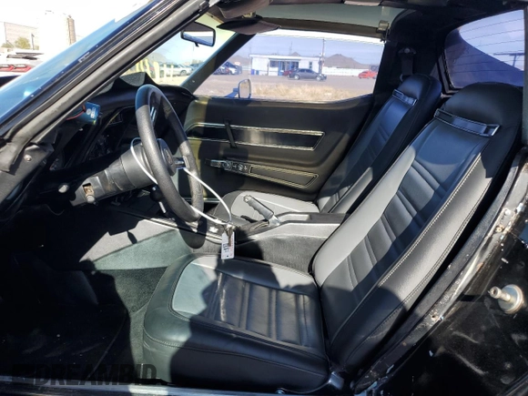 1977 Chevrolet Corvette with VIN 1Z37L7S412823, listed as a Copart auction lot 82405174 with 9,206 mi miles and Clean title. Bid and sale history available at DreamBid. Image 7.