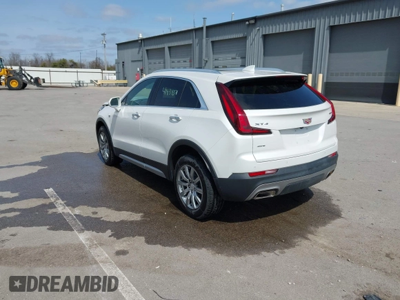 2020 Cadillac XT4 AWD Premium Luxury z VIN 1GYFZDR44LF036461, wystawiony jako IAAI lot #41934371 z przebiegiem 90 545 mil mil oraz . Historia ofert i sprzedaży dostępna na DreamBid. Obrazek 3.