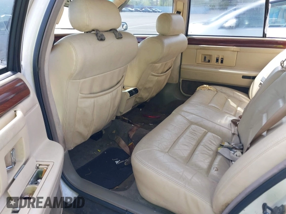 1995 Cadillac DeVille z VIN 1G6KD52BXSU278072, wystawiony jako IAAI lot #42036812 z przebiegiem 149 180 mil mil oraz . Historia ofert i sprzedaży dostępna na DreamBid. Obrazek 8.