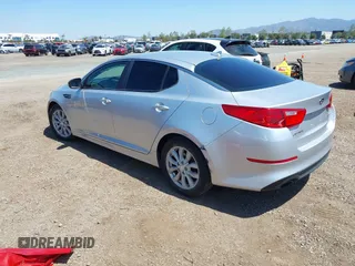 2015 Kia Optima EX with VIN 5XXGN4A73FG436223, listed as a IAAI auction lot 41970418 with 174,002 mi miles. Bid and sale history available at carsss.com. Image 3.