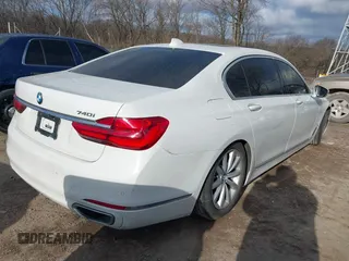 2018 BMW 7 Series 740i with VIN WBA7E2C50JG742505, listed as a IAAI auction lot 41238238 with 111,901 mi miles. Bid and sale history available at carsss.com. Image 4.