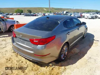 2015 Kia Optima SX Turbo with VIN 5XXGR4A63FG384894, listed as a IAAI auction lot 41843637 with 101,364 mi miles and . Bid and sale history available at DreamBid. Image 4.