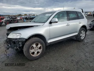 2004 Volkswagen Touareg with VIN WVGCM77L04D071137, listed as a Copart auction lot 82164944 with 231,296 mi miles and Salvage Title. Bid and sale history available at DreamBid. Image 1.