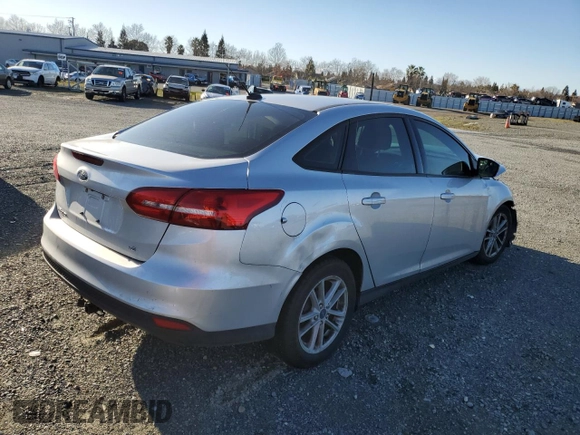 2018 Ford Focus SE with VIN 1FADP3F23JL226448, listed as a Copart auction lot 43877055 with 77,253 mi miles and Salvage Title. Bid and sale history available at carsss.com. Image 3.