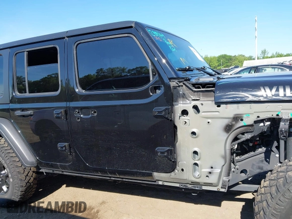 2021 Jeep Wrangler Unlimited Sport S with VIN 1C4HJXDNXMW646194, listed as a IAAI auction lot 42243169 with 44,237 mi miles and . Bid and sale history available at DreamBid. Image 13.