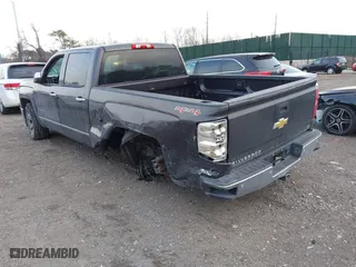 2014 Chevrolet Silverado 1500 LTZ with VIN 3GCUKSEC4EG384636, listed as a IAAI auction lot 41352484 with 153,976 mi miles. Bid and sale history available at carsss.com. Image 3.