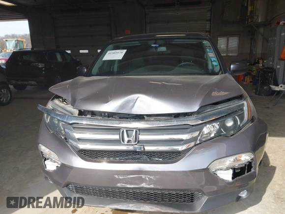 2016 Honda Pilot EX-L with VIN 5FNYF6H51GB097323, listed as a IAAI auction lot 41989978 with 105,006 mi miles. Bid and sale history available at carsss.com. Image 12.