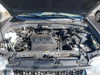 2004 Ford Escape XLT with VIN 1FMYU93174KB10825, listed as a IAAI auction lot 41703192 with 240,355 mi miles. Bid and sale history available at carsss.com. Image 10.