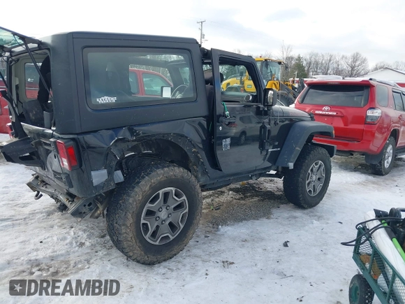 2013 Jeep Wrangler Rubicon 10th Anniversary with VIN 1C4BJWCG3DL591186, listed as a IAAI auction lot 41315969 with 54,984 mi miles and . Bid and sale history available at DreamBid. Image 4.