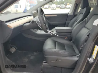 2024 Tesla Model Y Long Range с VIN 7SAYGDEE8RA243340, выставлен на аукционе Copart как лот 60527745 с пробегом 17 307 миль миль и Списание • Salvage title. История ставок и продаж доступна на DreamBid. Изображение 7.
