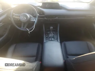 2021 Mazda 3 Select with VIN JM1BPBKL9M1345549, listed as a Copart auction lot 80771954 with 59,400 mi miles and Salvage title. Bid and sale history available at DreamBid. Image 8.