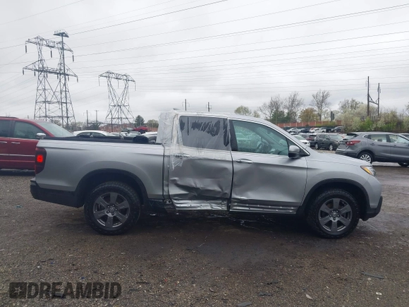 2020 Honda Ridgeline RTL-E with VIN 5FPYK3F73LB004365, listed as a IAAI auction lot 41965887 with 80,981 mi miles and . Bid and sale history available at DreamBid. Image 13.