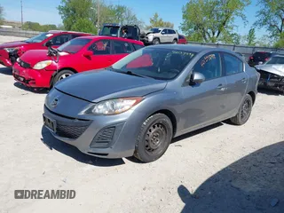2011 Mazda Mazda3 i Sport with VIN JM1BL1UF4B1903446, listed as a IAAI auction lot 42139591 with 142,150 mi miles. Bid and sale history available at carsss.com. Image 2.