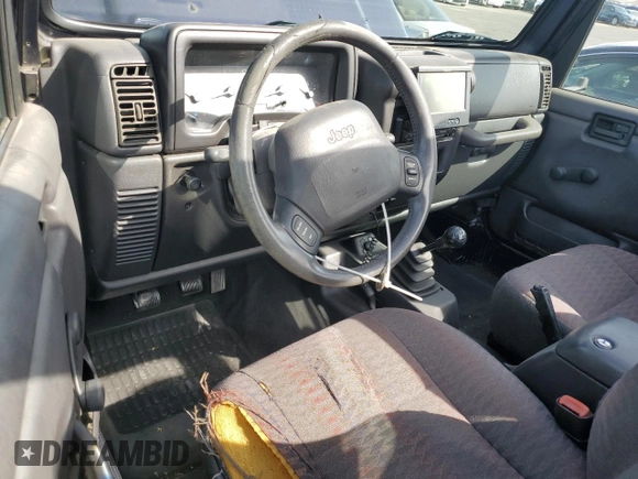 1999 Jeep Wrangler Sport with VIN 1J4FY19S0XP467587, listed as a Copart auction lot 51339415 with 168,142 mi miles and Clean Title. Bid and sale history available at carsss.com. Image 8.