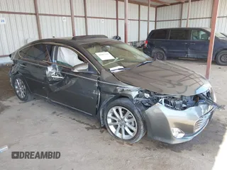 2014 Toyota Avalon Limited with VIN 4T1BK1EB0EU121139, listed as a IAAI auction lot 41987229 with 91,782 mi miles. Bid and sale history available at carsss.com. Image 1.