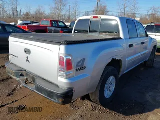 2006 Mitsubishi Raider LS with VIN 1Z7HT28K86S580062, listed as a IAAI auction lot 41766477 with 255,704 mi miles. Bid and sale history available at carsss.com. Image 4.