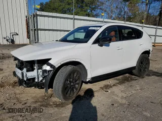 2024 Mazda CX-5 2.5 Carbon Turbo with VIN JM3KFBAY7R0378845, listed as a Copart auction lot 49229395 with 15,031 mi miles and Salvage Title. Bid and sale history available at carsss.com. Image 1.