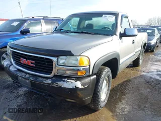 1999 GMC New Sierra 1500 SLE with VIN 1GTEK14T4XE539051, listed as a IAAI auction lot 41472124 with 151,088 mi miles. Bid and sale history available at carsss.com. Image 2.