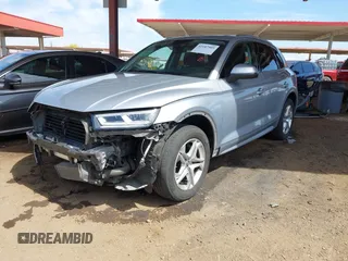 2018 Audi Q5 Premium Plus z VIN WA1BNAFY9J2055656, wystawiony jako IAAI lot #42187509 z przebiegiem 74 572 mil mil oraz . Historia ofert i sprzedaży dostępna na DreamBid. Obrazek 2.