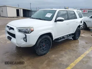 2015 Toyota 4Runner Limited with VIN JTEBU5JR3F5214950, listed as a IAAI auction lot 41449391 with 163,030 mi miles and . Bid and sale history available at DreamBid. Image 2.