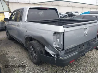2018 Honda Ridgeline Sport with VIN 5FPYK2F19JB000713, listed as a IAAI auction lot 41300244 with 52,119 mi miles and . Bid and sale history available at DreamBid. Image 3.