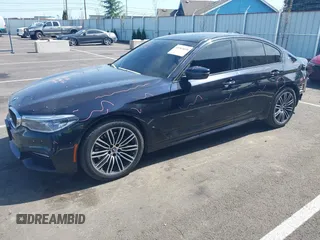 2018 BMW 5 Series 530e xDrive with VIN WBAJB1C51JB374308, listed as a IAAI auction lot 41965038 with 122,791 mi miles and . Bid and sale history available at carsss.com. Image 2.