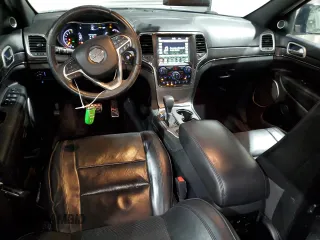 2018 Jeep Grand Cherokee Overland with VIN 1C4RJFCG1JC287784, listed as a Copart auction lot 50391255 with 105,981 mi miles and Salvage title. Bid and sale history available at DreamBid. Image 8.