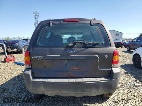 2006 Ford Escape XLT с VIN 1FMCU93106KC50549, выставлен на аукционе Copart как лот 54784475 с пробегом 158 211 миль миль и Списание • Salvage title. История ставок и продаж доступна на DreamBid. Изображение 6.