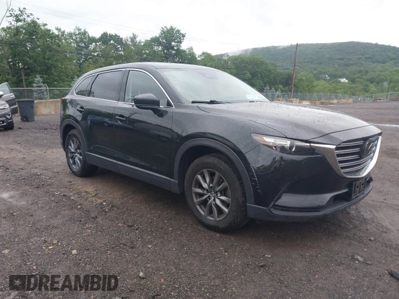 2020 Mazda CX-9 Touring with VIN JM3TCBCY5L0422262, listed as a IAAI auction lot 42456246 with 69,211 mi miles and . Bid and sale history available at DreamBid. Image 1.