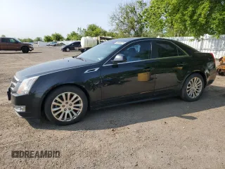 2011 Cadillac CTS Premium z VIN 1G6DS5ED6B0135722, wystawiony jako Copart lot #58665375 z przebiegiem 205 021 mil mil oraz Czysty tytuł • Clean title. Historia ofert i sprzedaży dostępna na DreamBid. Obrazek 1.