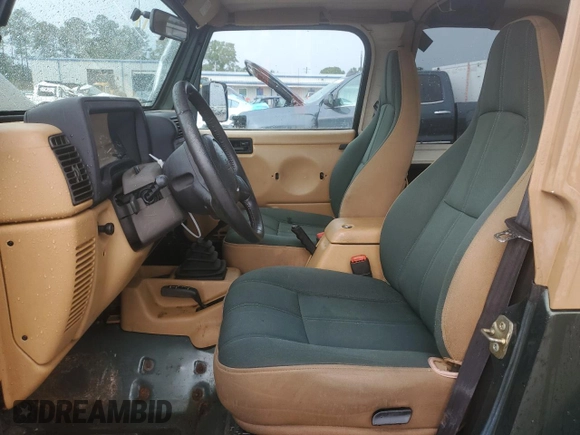 1997 Jeep Wrangler Sahara with VIN 1J4FY49SXVP453369, listed as a Copart auction lot 72826744 with 145,852 mi miles and Salvage Title. Bid and sale history available at carsss.com. Image 7.