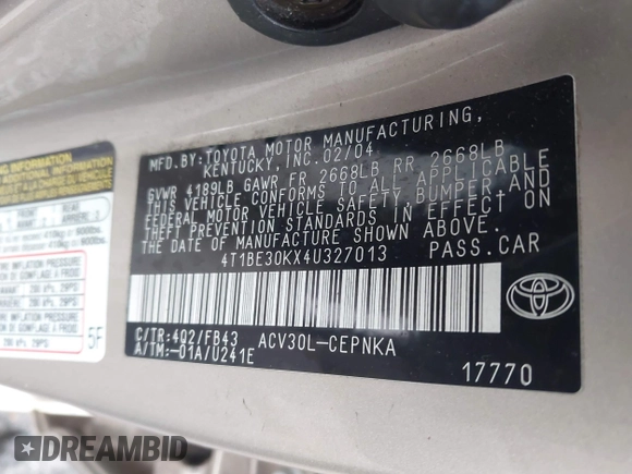 2004 Toyota Camry LE with VIN 4T1BE30KX4U327013, listed as a IAAI auction lot 41987105 with 241,236 mi miles. Bid and sale history available at carsss.com. Image 9.