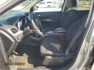 2014 Dodge Journey SXT z VIN 3C4PDCBG7ET126901, wystawiony jako Copart lot #52882625 z przebiegiem 176 923 mil mil oraz Szkoda całkowita • Salvage title. Historia ofert i sprzedaży dostępna na DreamBid. Obrazek 7.