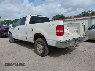 2005 Ford F-150 STX with VIN 1FTRX14W85NA51358, listed as a IAAI auction lot 41942560 with 1 mi miles. Bid and sale history available at carsss.com. Image 3.