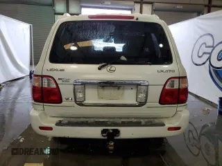 2004 Lexus LX 470 z VIN JTJHT00WX43539807, wystawiony jako Copart lot #87842755 z przebiegiem 335 478 mil mil oraz Czysty tytuł • Clean title. Historia ofert i sprzedaży dostępna na DreamBid. Obrazek 6.