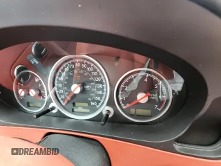 2004 Chrysler Crossfire z VIN 1C3AN69L14X009846, wystawiony jako Copart lot #72343324 z przebiegiem Nie podano mil oraz Szkody całkowita. Historia ofert i sprzedaży dostępna na DreamBid. Obrazek 6.