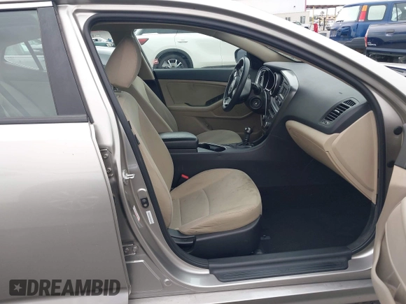 2015 Kia Optima LX with VIN KNAGM4A78F5584534, listed as a IAAI auction lot 42182927 with 63,225 mi miles and . Bid and sale history available at carsss.com. Image 5.