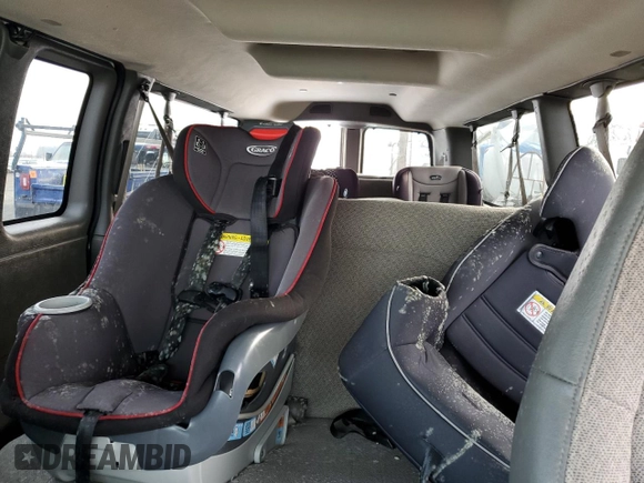 2018 Chevrolet Express Passenger LT with VIN 1GAZGPFG3J1245055, listed as a Copart auction lot 87807965 with 106,634 mi miles and Salvage title. Bid and sale history available at DreamBid. Image 10.