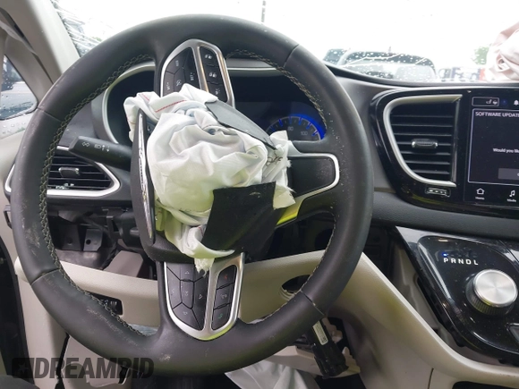 2022 Chrysler Pacifica Touring L with VIN 2C4RC1BG8NR116770, listed as a IAAI auction lot 42093616 with 98,479 mi miles and . Bid and sale history available at DreamBid. Image 6.