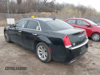 2016 Chrysler 300 with VIN 2C3CCAEG0GH348651, listed as a IAAI auction lot 41967981 with 141,728 mi miles. Bid and sale history available at carsss.com. Image 3.