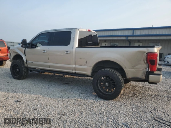 2017 Ford F-250 Lariat with VIN 1FT7W2BT0HEE63562, listed as a Copart auction lot 60880545 with 122,996 mi miles and Salvage title. Bid and sale history available at DreamBid. Image 2.