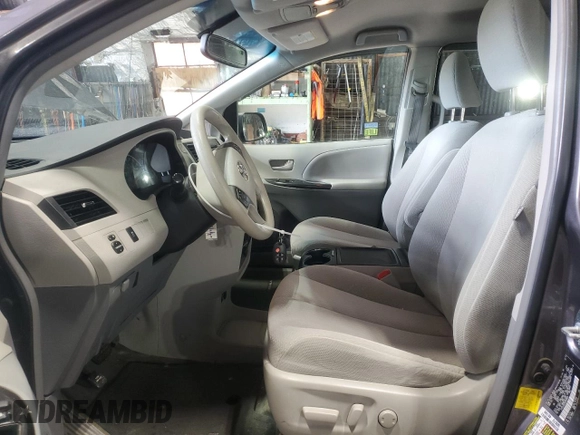 2013 Toyota Sienna LE with VIN 5TDJK3DCXDS059838, listed as a Copart auction lot 52107215 with 142,582 mi miles and Clean Title. Bid and sale history available at carsss.com. Image 7.