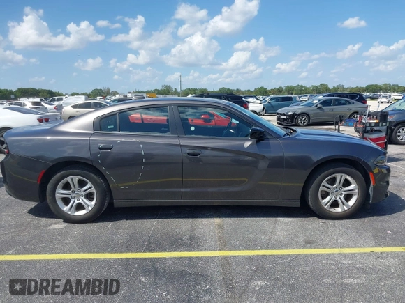 2023 Dodge Charger SXT with VIN 2C3CDXBG0PH571518, listed as a IAAI auction lot 42026774 with 47,394 mi miles and . Bid and sale history available at DreamBid. Image 13.