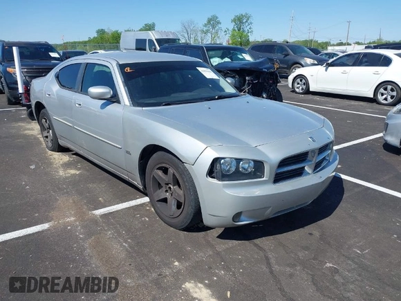 2010 Dodge Charger SXT with VIN 2B3CA3CV4AH253226, listed as a IAAI auction lot 42031664 with 173,785 mi miles. Bid and sale history available at carsss.com. Image 1.