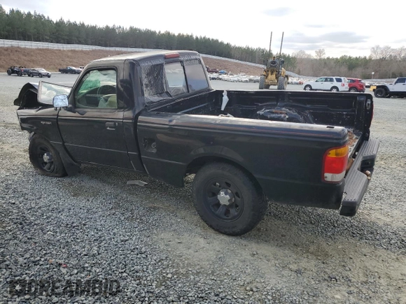 1999 Ford Ranger XL with VIN 1FTYR10C0XTA88744, listed as a Copart auction lot 44258415 with 202,709 mi miles and Salvage title. Bid and sale history available at DreamBid. Image 2.