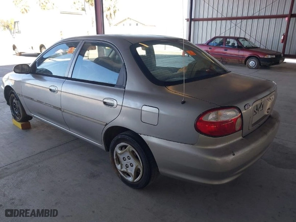 2000 Kia Spectra with VIN KNAFB121XY5905566, listed as a IAAI auction lot 41755491 with NaN miles. Bid and sale history available at carsss.com. Image 3.
