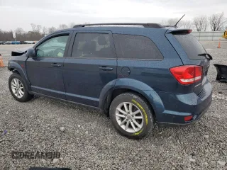 2014 Dodge Journey SXT with VIN 3C4PDCBB2ET156070, listed as a Copart auction lot 51189955 with 82,638 mi miles and Salvage Title. Bid and sale history available at DreamBid. Image 2.